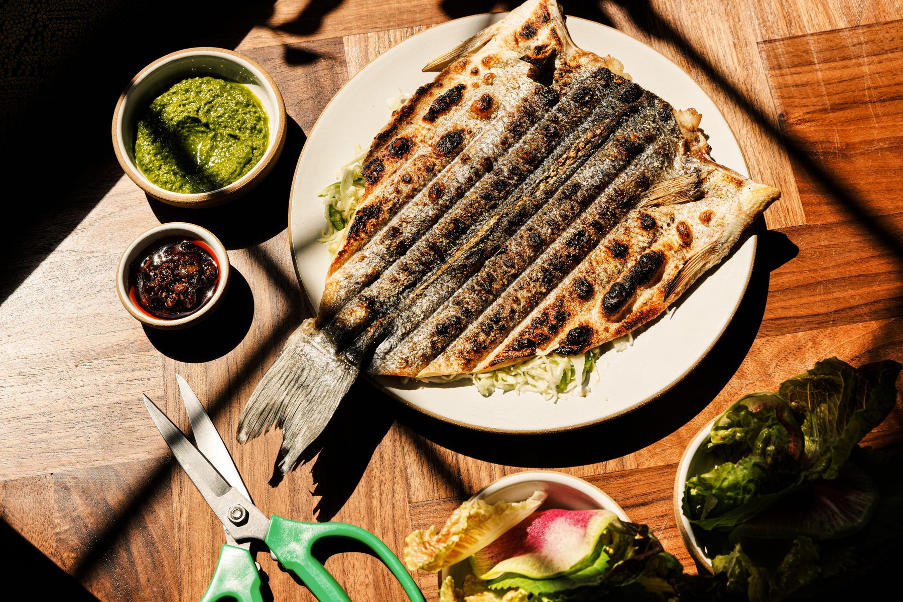 Whole branzino served bossam-style