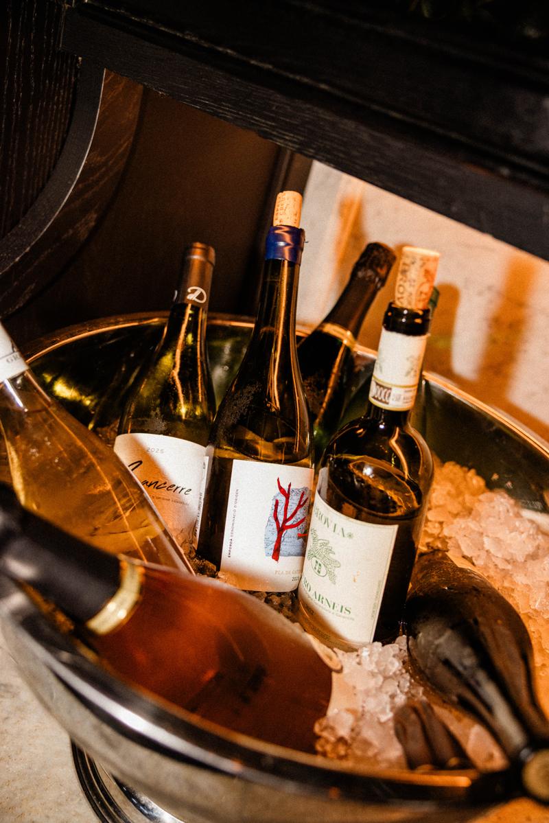 Bottles of wine chilling on ice