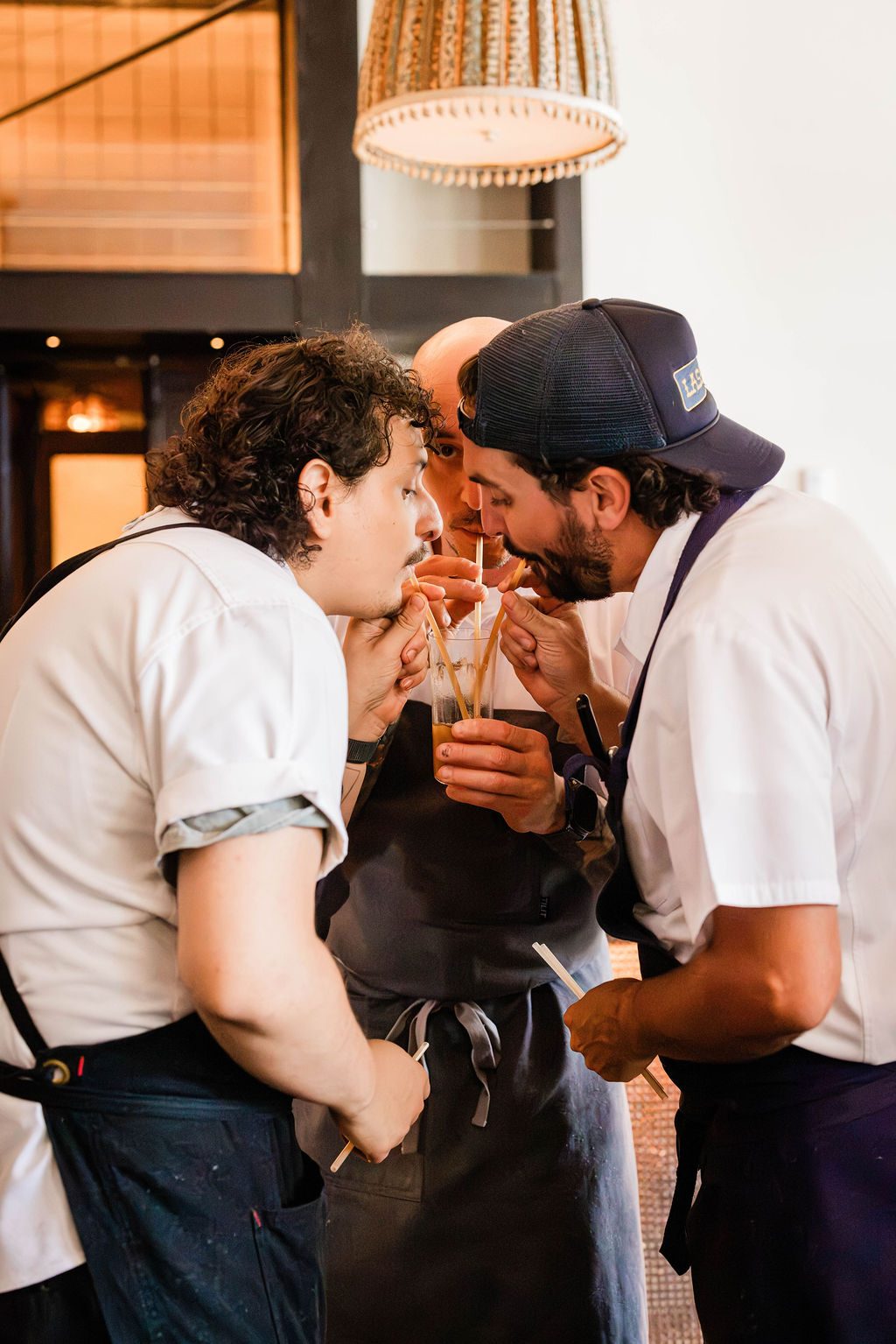 Chefs sharing a drink after service